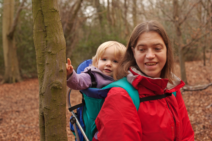 Emily inspecting a tree