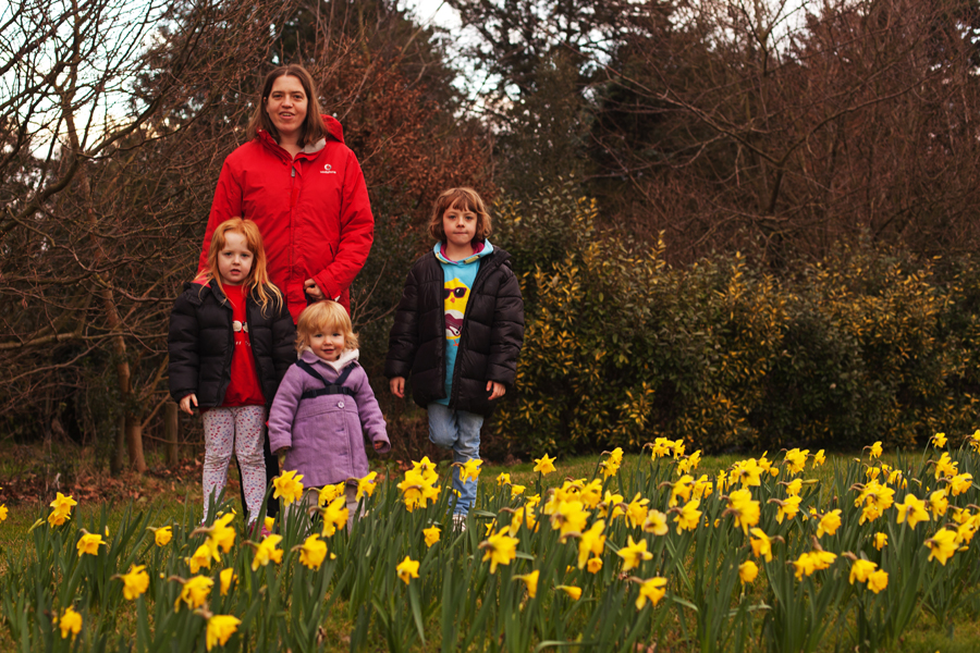 Four girls and a host of golden daffodils