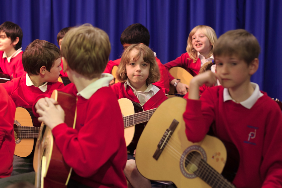 Rebekah with her fellow guitarists