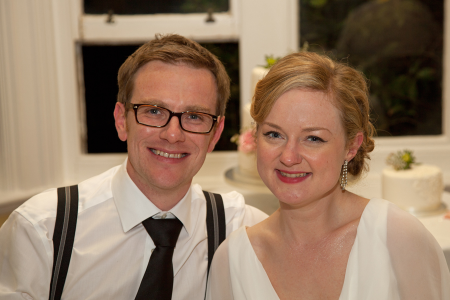 The happy couple posing between courses