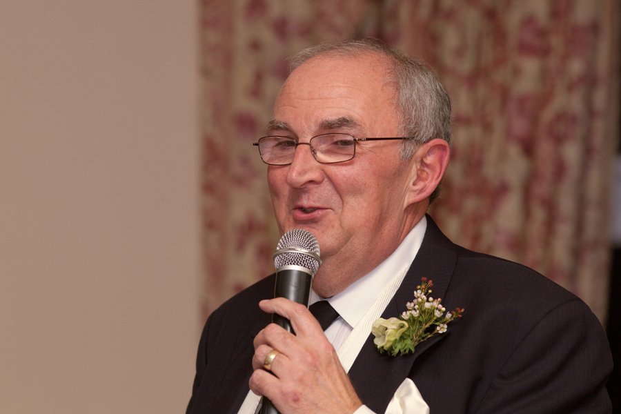 Suz's dad delivering his speech