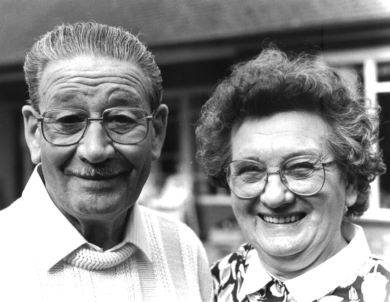 Grandad and Grandma in their garden celebrating 50 years of marriage