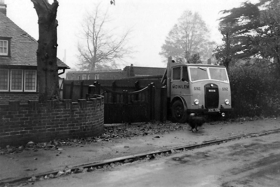 A John Mowlem lorry, backed into the drive during construction of Number 55