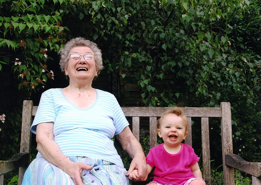 Grandma with Rebekah in the garden