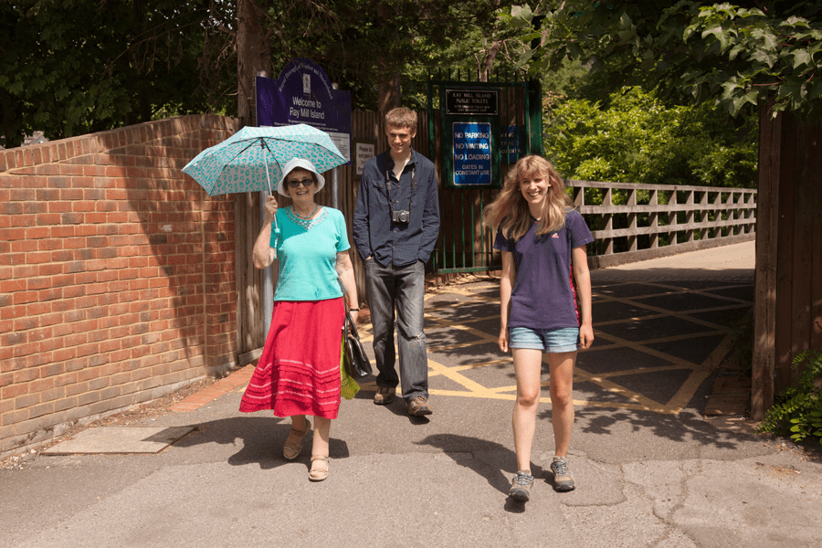 Mum with her makeshift parasol, with Hugh and Katy