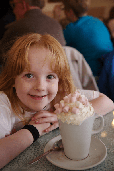 Holly looking forward to her hot chocolate